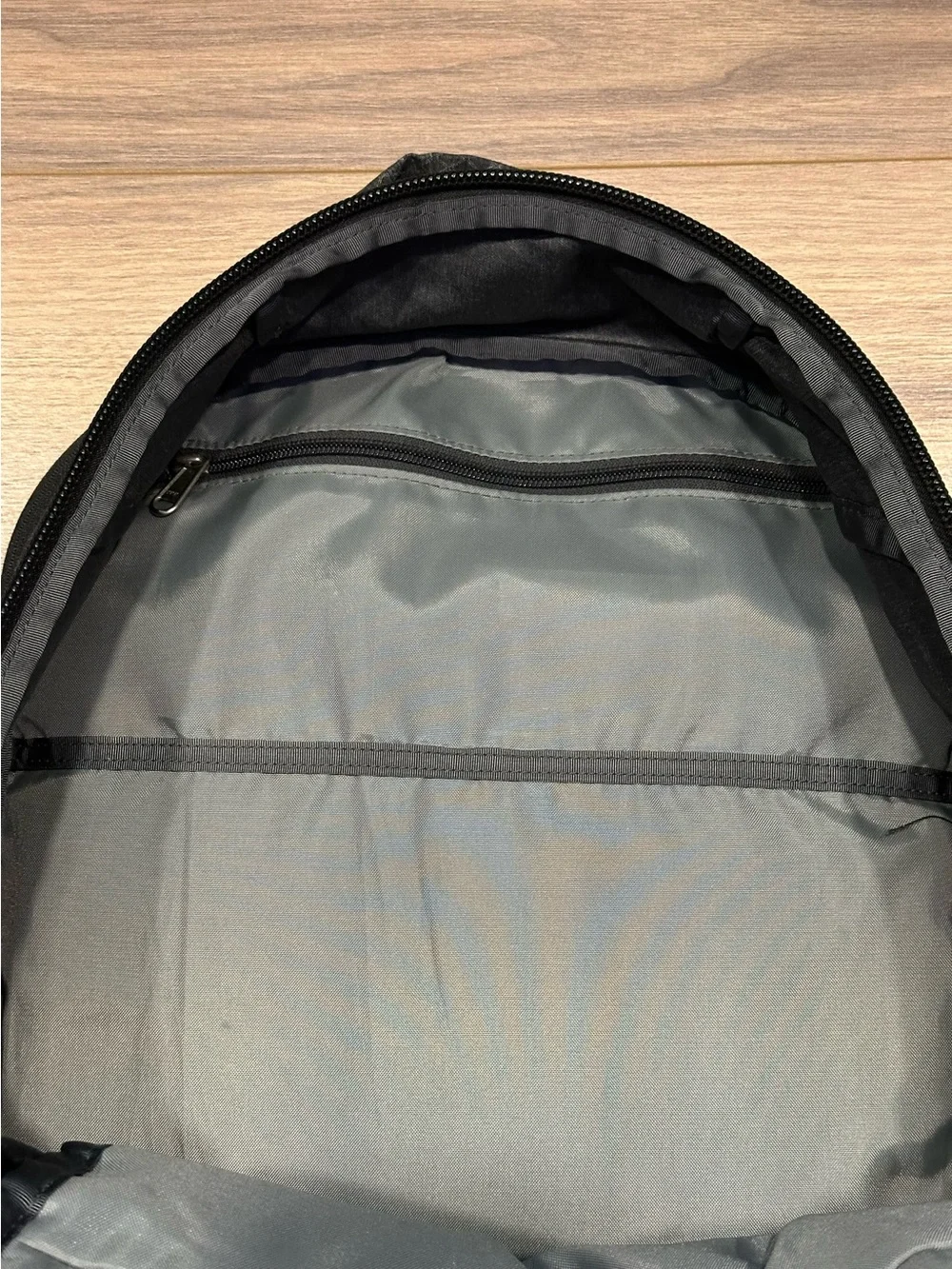 The North Face Surge Backpack in TNF Black Heather Copper/TNF Black